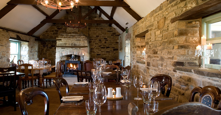 view of dining area with open fire in the Black Horse Beamish inn and pub